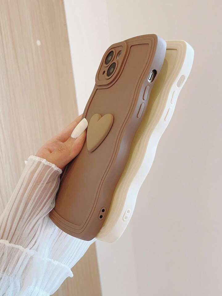 UN PAQUET DE DEUX COQUES NUDE MOTIF COEUR