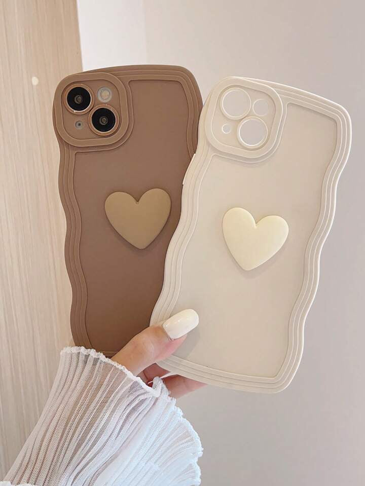 UN PAQUET DE DEUX COQUES NUDE MOTIF COEUR